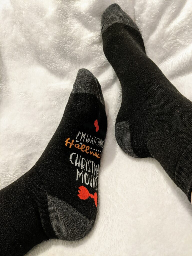 Day 1: socks! They say "If you can read this..." "I'm watching Hallmark Christmas movies." Appropriate for a girl who LOVES Hallmark movies.