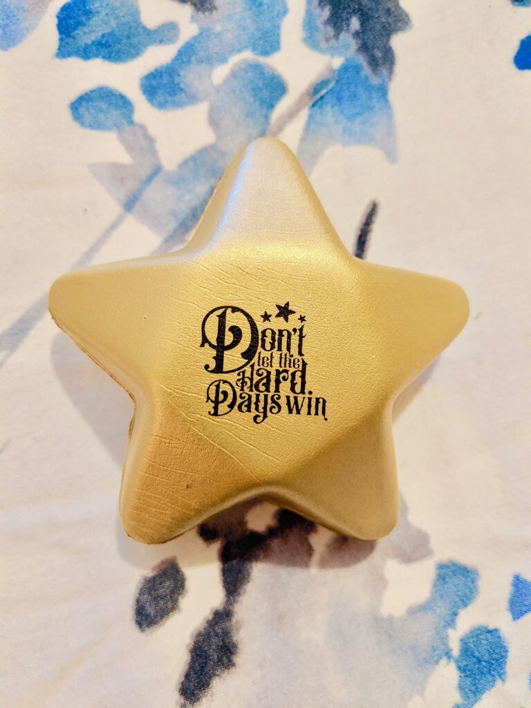 Day 18: a little, star-shaped stress ball. It's cute, but I won't get much use out of it.